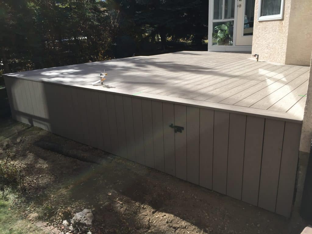 Custom PVC backyard deck project completed by Pemadale in the Hamptons Calgary