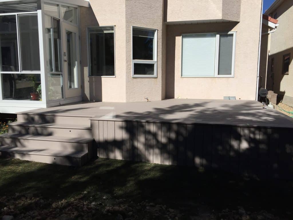 Low maintenance PVC backyard deck installed by Pemadale in the Hamptons Calgary