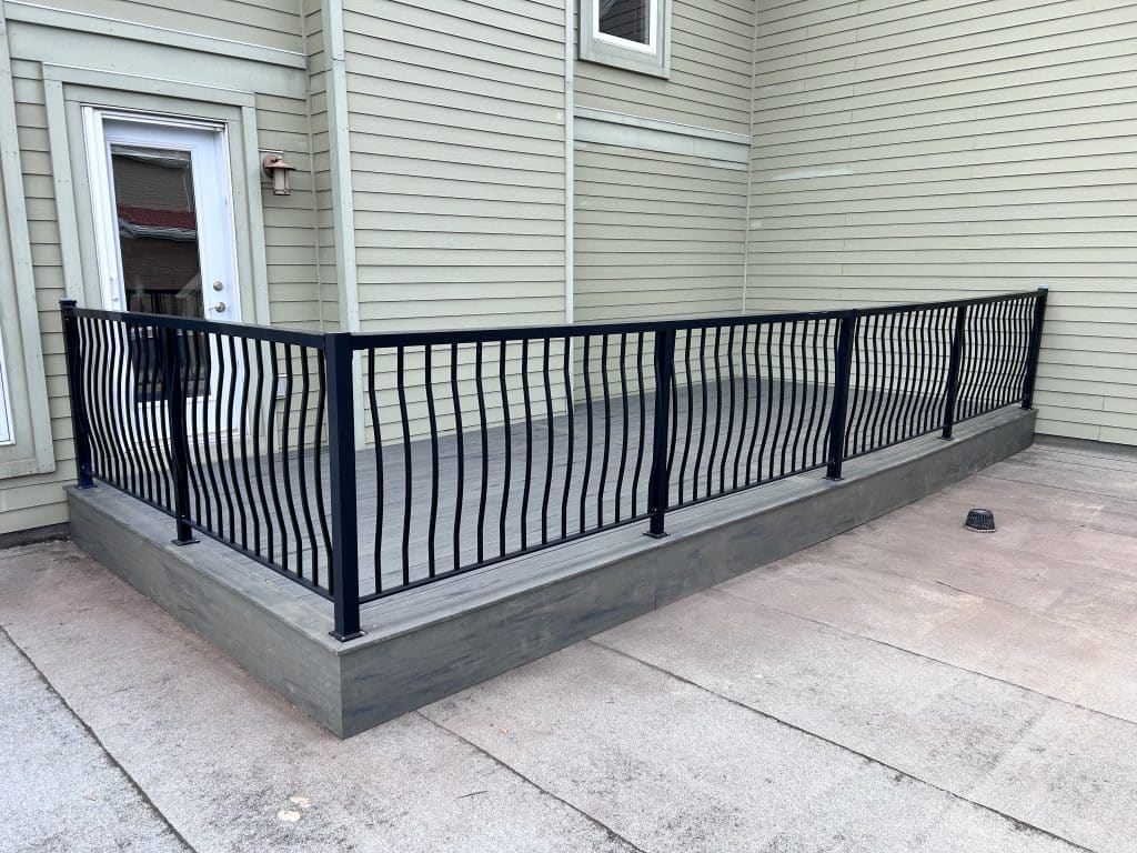 Vinyl rooftop deck with aluminum railing built in Calgary by Pemadale